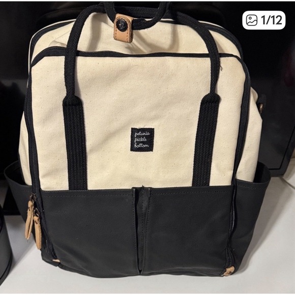 Petunia Pickle Bottom Handbags - Petunia Pickle Bottom Boxy Backpack Canvas Cream And Black Baby Diaper Bag